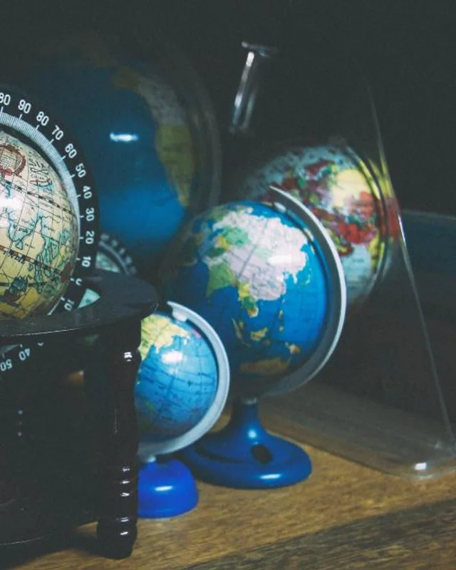 Antique globes on a desk